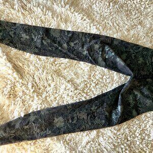 Lululemon yoga pants. Black with silver floral print